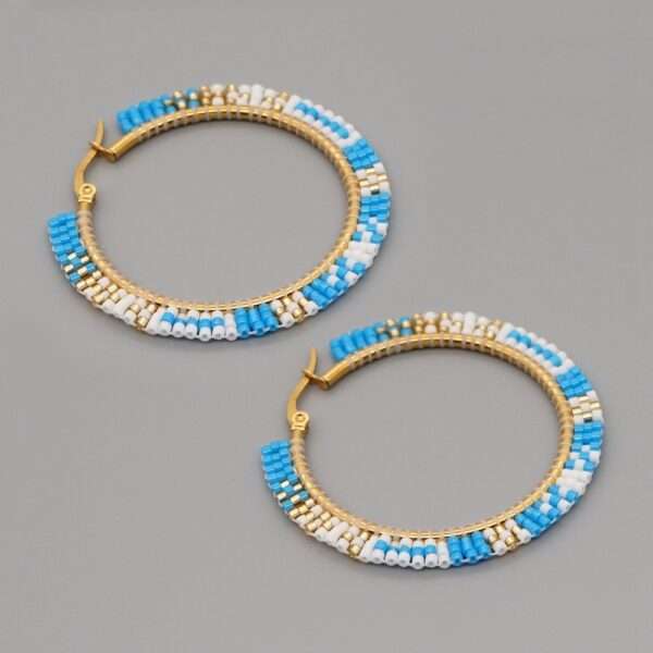 Stunning large hoop earrings with natural rice beads - Shop now