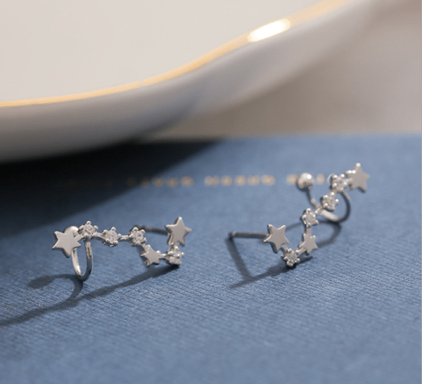 Handmade sterling silver ear climbers featuring the Big Dipper constellation, perfect for stargazers and astronomy enthusiasts
