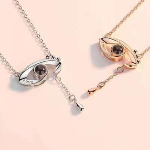 A striking eye pendant necklace showcasing a mesmerizing new design in jewelry. The pendant features an intricately crafted eye motif,